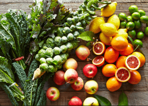 a group of fruits and vegetables on a wood surface Healthy Weight Loss Diets Tonbridge